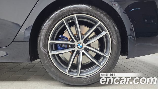 BMW 5-Series 2023 — photo 7