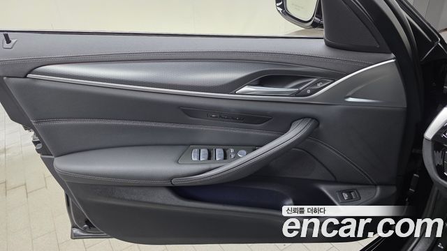 BMW 5-Series 2023 — photo 14