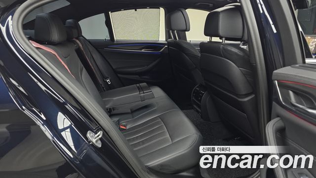 BMW 5-Series 2023 — photo 16