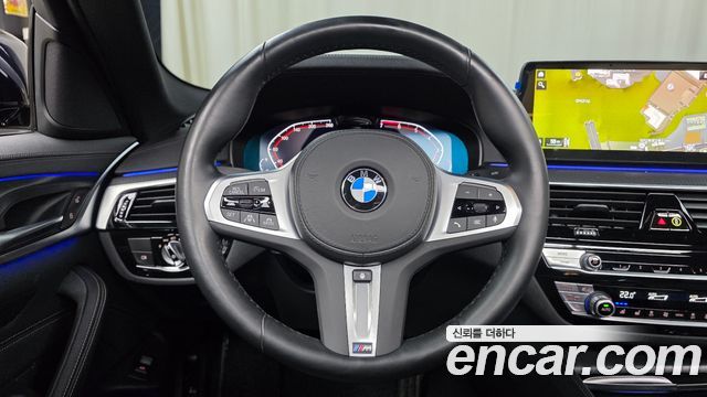 BMW 5-Series 2023 — photo 30