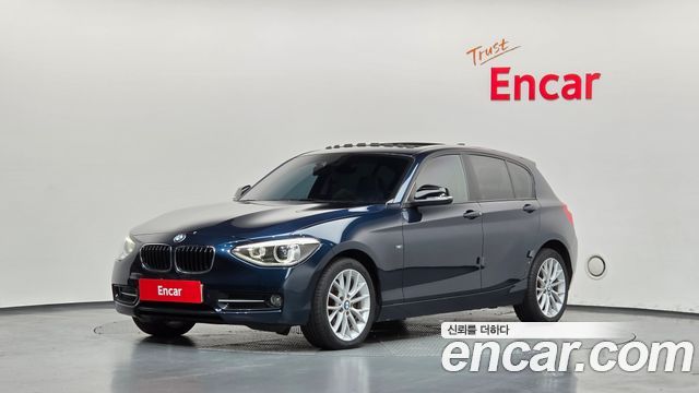 BMW 1-Series 2015 — photo 1