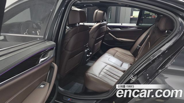 BMW 5-Series 2023 — photo 16