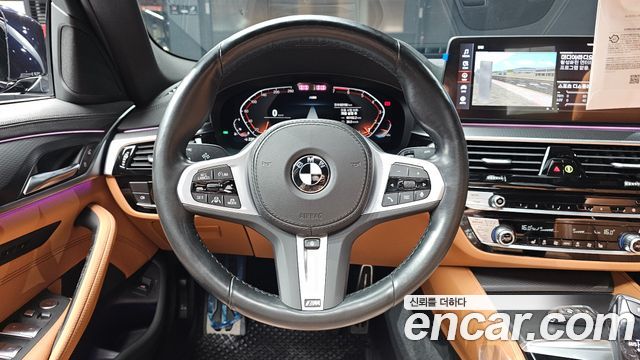 BMW 5-Series 2023 — photo 19