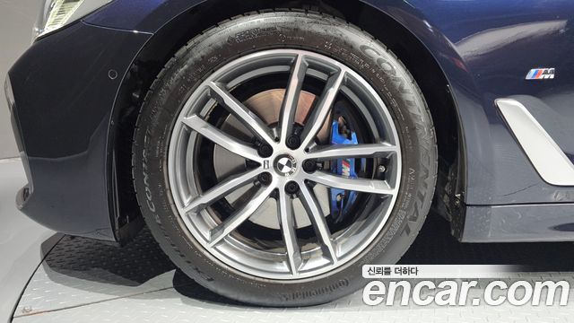 BMW 5-Series 2023 — photo 21