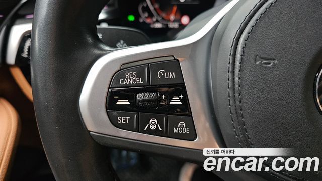 BMW 5-Series 2023 — photo 28
