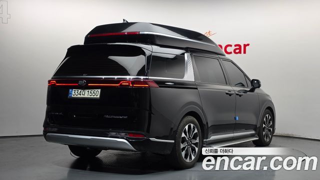 Kia Canival 2021 — photo 2
