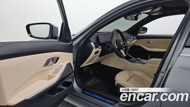 BMW 3-Series 2024 — photo 13