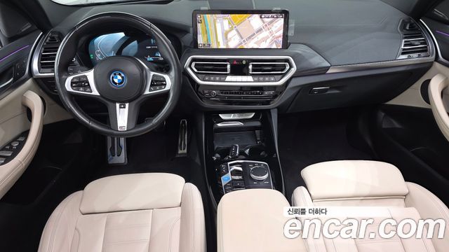 BMW iX3 2024 — photo 10