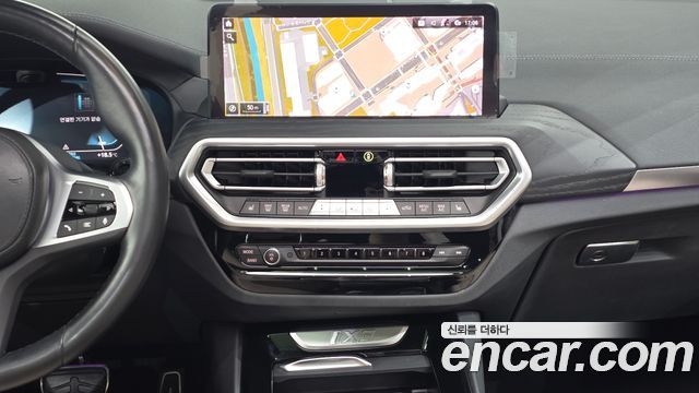 BMW iX3 2024 — photo 19