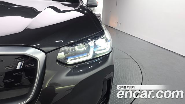 BMW iX3 2024 — photo 8