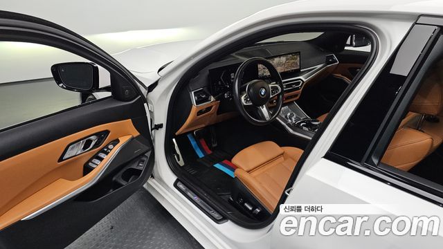 BMW 3-Series 2023 — photo 13