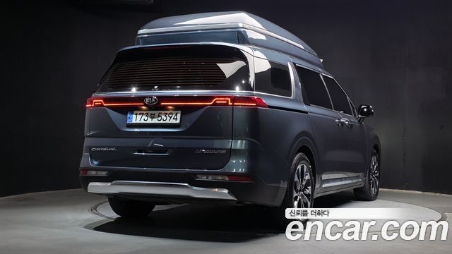 Kia Canival 2021 — photo 2