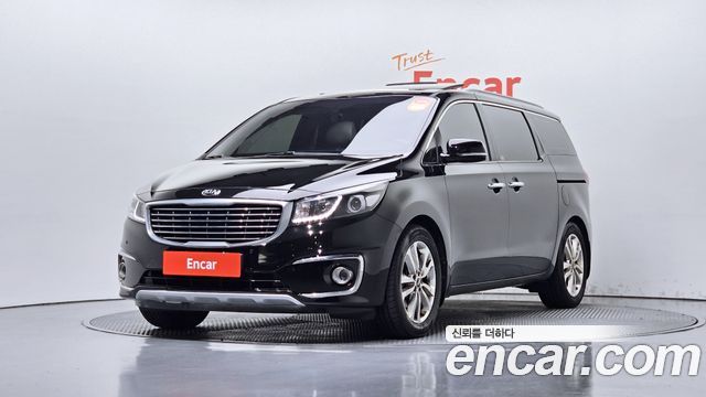 Kia Canival 2015 — photo 1