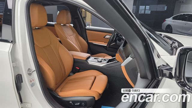 BMW 3-Series 2024 — photo 16