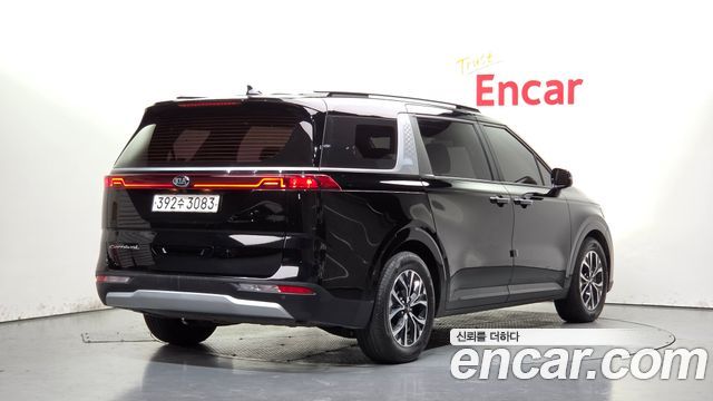 Kia Canival 2021 — photo 2