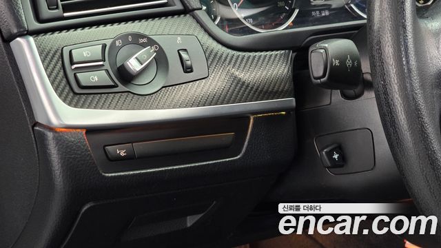 BMW 5-Series 2013 — photo 14