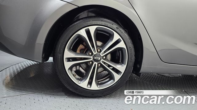 Kia K3 2013 — photo 5