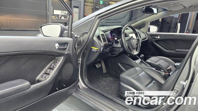 Kia K3 2013 — photo 13