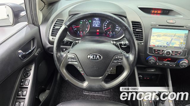 Kia K3 2013 — photo 19