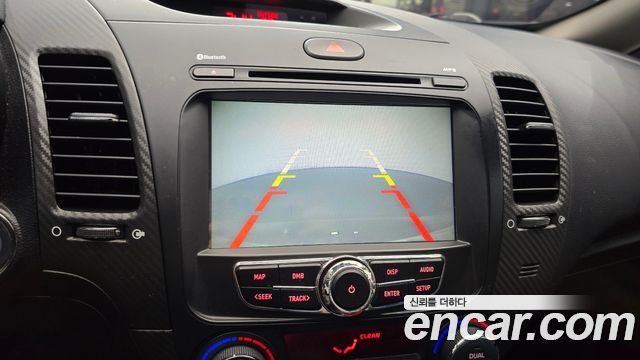 Kia K3 2013 — photo 21