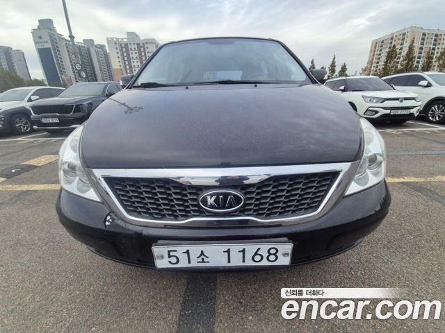 Kia Canival 2012 — photo 1