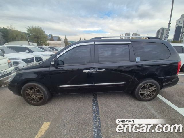 Kia Canival 2012 — photo 3