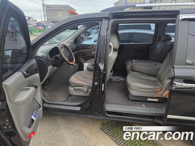 Kia Canival 2012 — photo 5