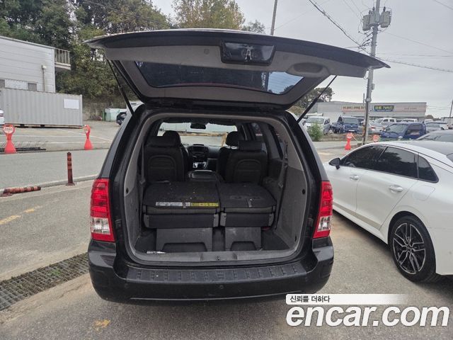 Kia Canival 2012 — photo 14
