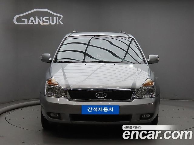 Kia Canival 2011 — photo 3