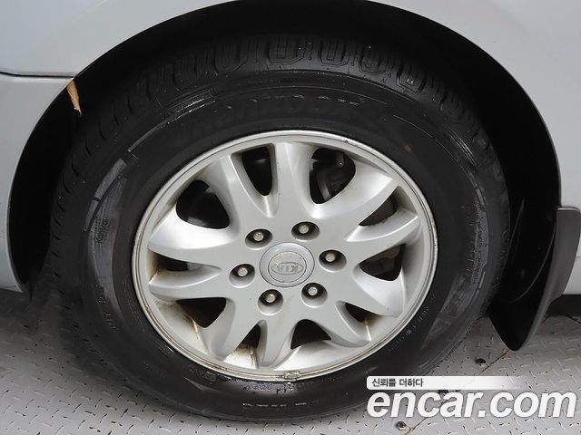 Kia Canival 2011 — photo 5