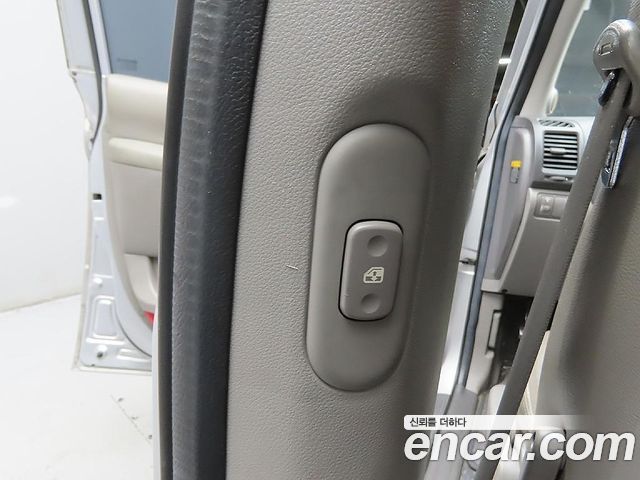 Kia Canival 2011 — photo 13