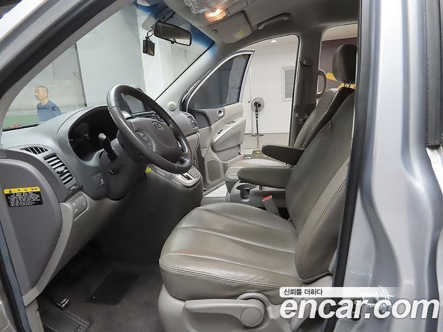 Kia Canival 2011 — photo 14