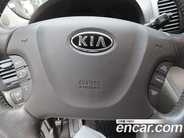 Kia Canival 2011 — photo 15