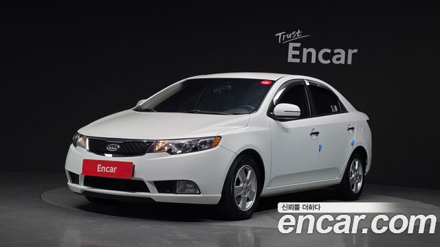 Kia Porte 2011 — photo 1
