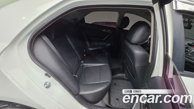 Kia Porte 2011 — photo 17