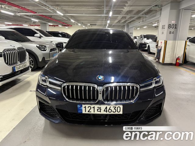 BMW 5-Series 2023 — photo 1
