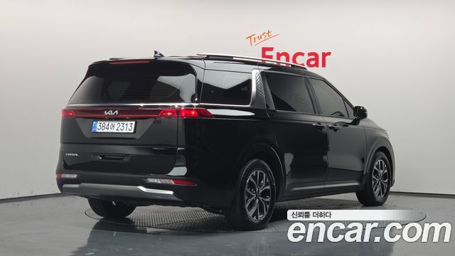 Kia Canival 2023 — photo 2