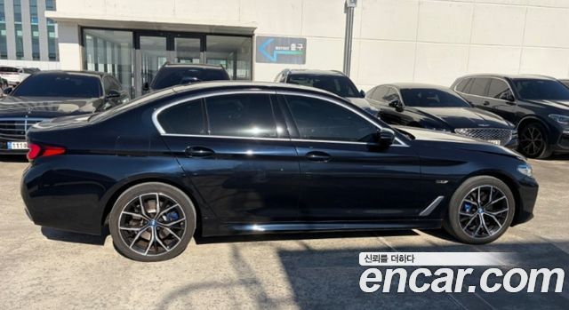 BMW 5-Series 2023 — photo 8