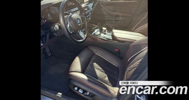 BMW 5-Series 2023 — photo 12