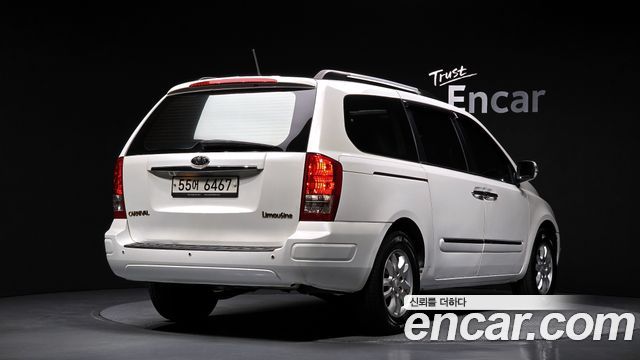 Kia Canival 2012 — photo 2