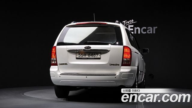 Kia Canival 2012 — photo 4
