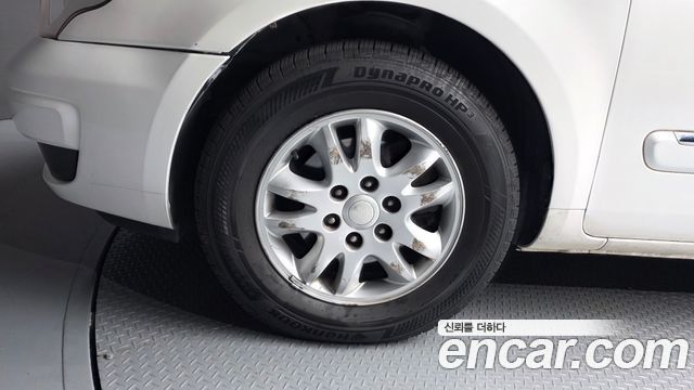 Kia Canival 2012 — photo 5