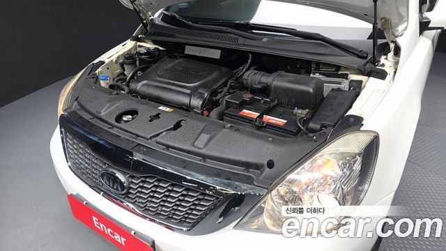 Kia Canival 2012 — photo 6