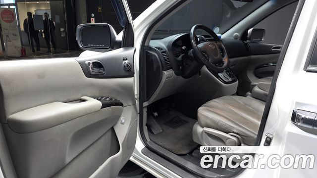 Kia Canival 2012 — photo 10