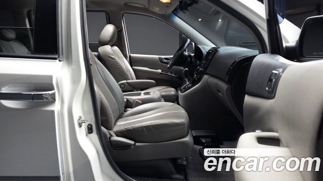 Kia Canival 2012 — photo 11