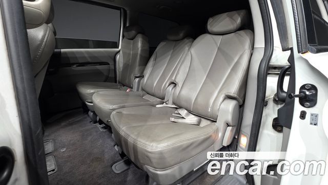Kia Canival 2012 — photo 12