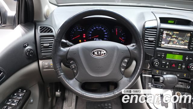 Kia Canival 2012 — photo 13