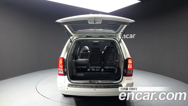 Kia Canival 2012 — photo 20