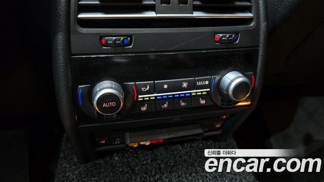 BMW 7-Series 2009 — photo 18