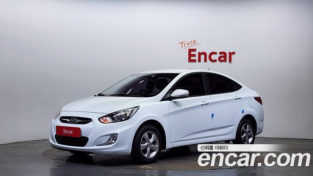 Hyundai Accent 2012 — photo 1